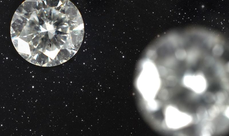 Two round brilliant cut colourless cremation diamonds from ashes.